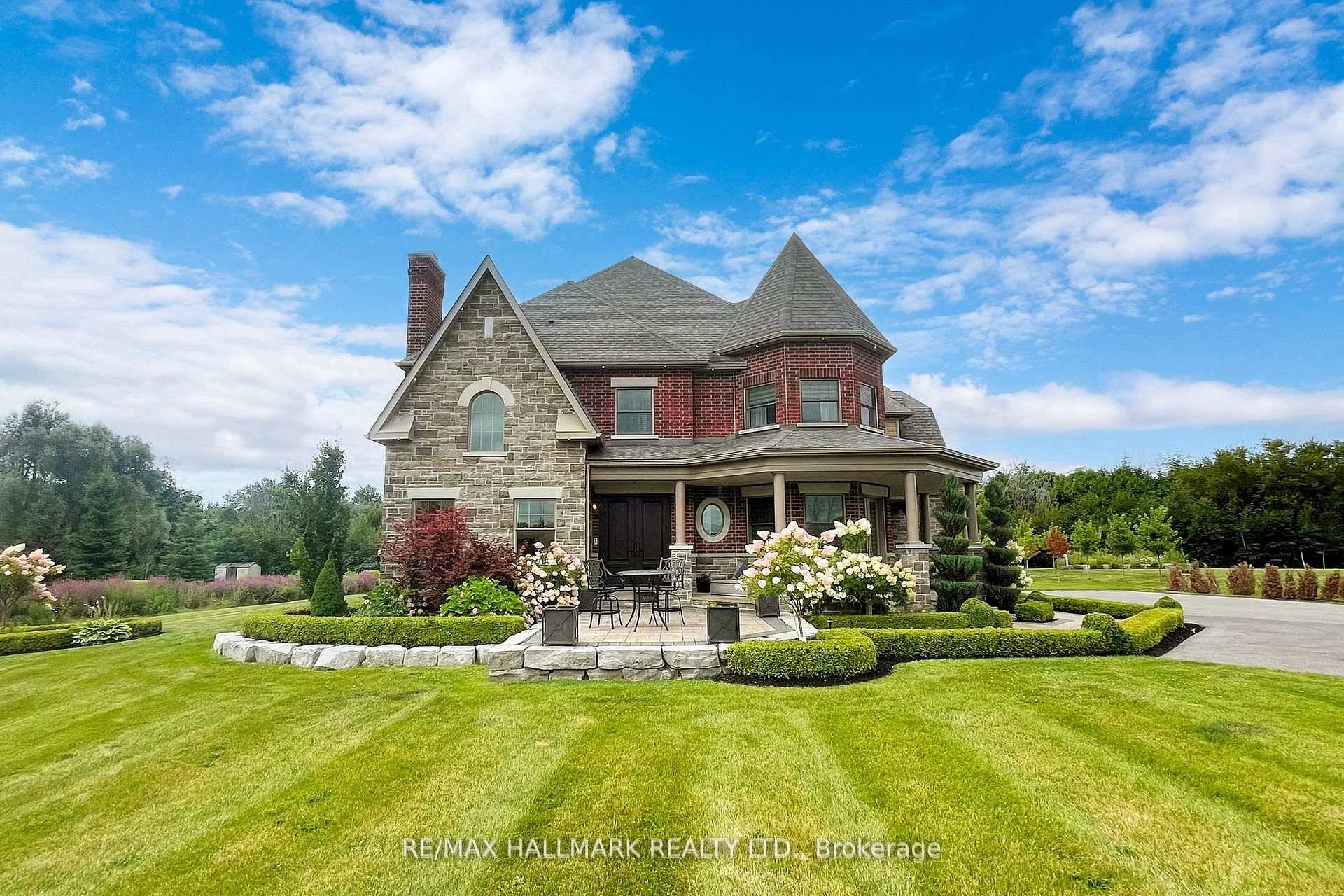 Nestled on a 2 plus acre lot and surrounded by protected greenspace, this custom built 5 bedroom home is a vision of luxury.