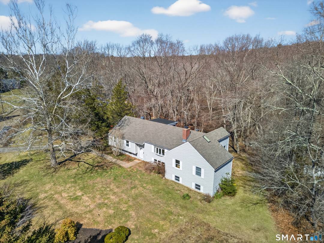 Offering 3, 532 sq ft of well designed living space, this 4 bedroom, 3.