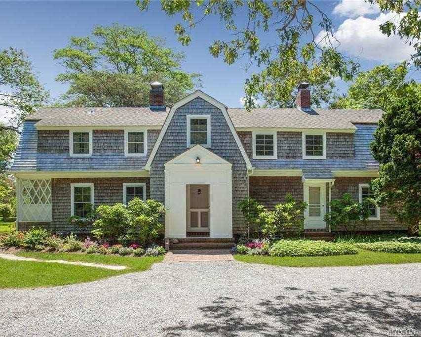 Estling Elegant 1908 Quogue Village Heritage District Traditional on historic community estate situated on 14 expansive acres.