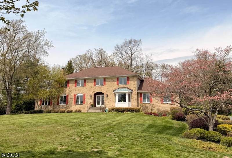 Great opportunity to own this spacious and stately brick front Colonial on 1 acre level property !