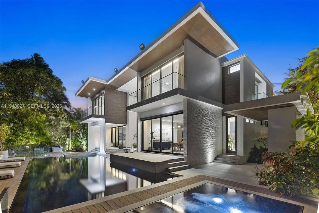 Maison Paloma This Choeff Levy designed custom built waterfront Cocoplum estate blends sculptural architecture with refined contemporary finishes, including dual entry waterfalls, Venetian plaster interiors, limestone amp ; Listone Giordano ...
