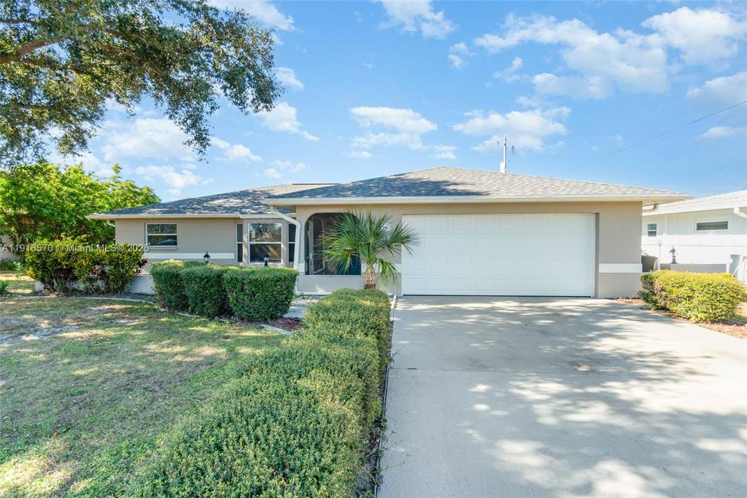 Discover a unique home in North Port, Florida, featuring an additional private suite with its own private entry.