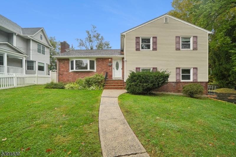 Wellcome to this 3 4 bedroom Split Level home brimming with potential and possibilities !