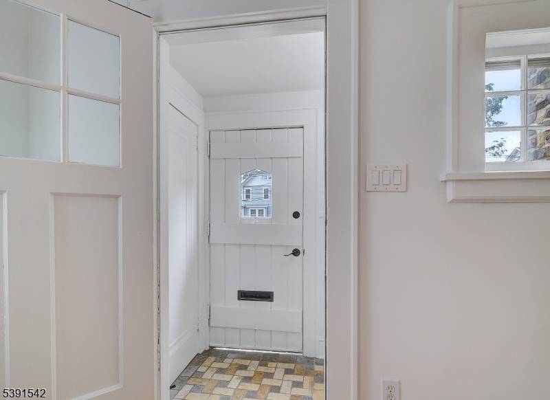 Charming Brookdale Colonial, ideally located and filled with warmth and thoughtful updates.