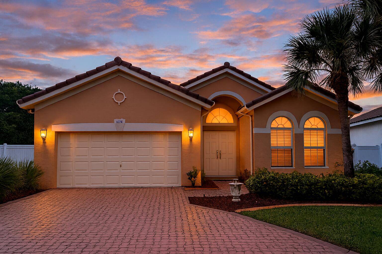 Beautiful 3BR 2BA lakefront home with 2, 103 SF in the gated community of Pembroke Shores.