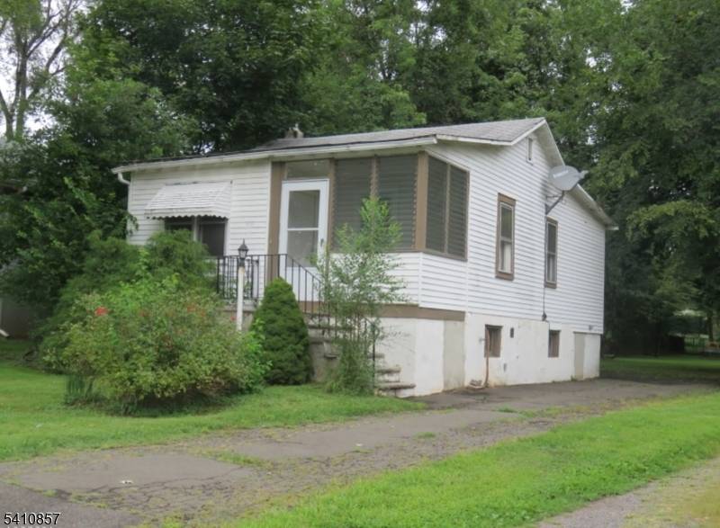 BRING YOUR CONTRACTOR ! VALUE IS IN THE LAND OFFERING A SHOVEL READY PROPERTY WITH IN USE UTILITIES NATURAL GAS, PUBLIC WATER, PUBLIC SEWER APPROVED PLANS, FINANCING ALLOWED survey in ...