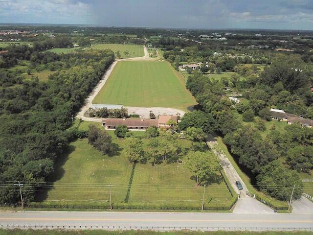 14 Stalls, Large Air conditioned tack room, two large paddocks, two large wash racks, horse exercise track, large stick and ball field.
