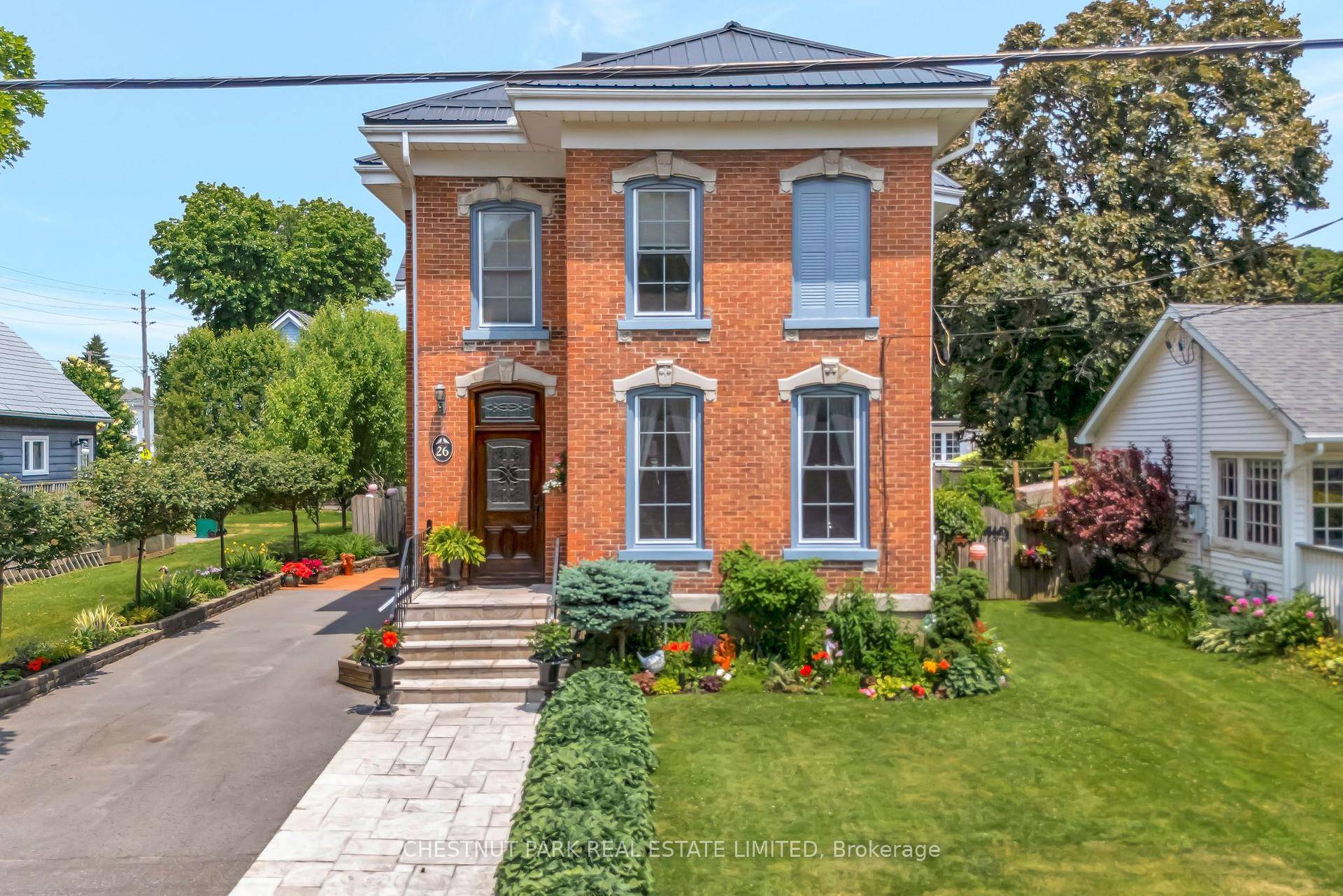 Welcome to 26 Centre St, a beautifully updated and impeccably maintained c.