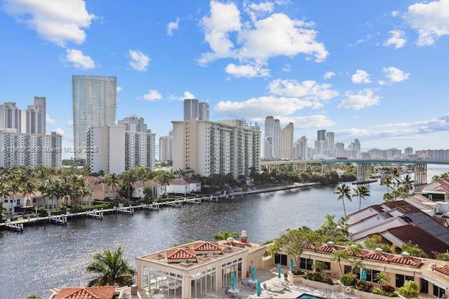 READY TO ENJOY OCEAN AND INTRACOASTAL VIEWS in this updated 2 bed 2 bath in beautiful Turnberry South.