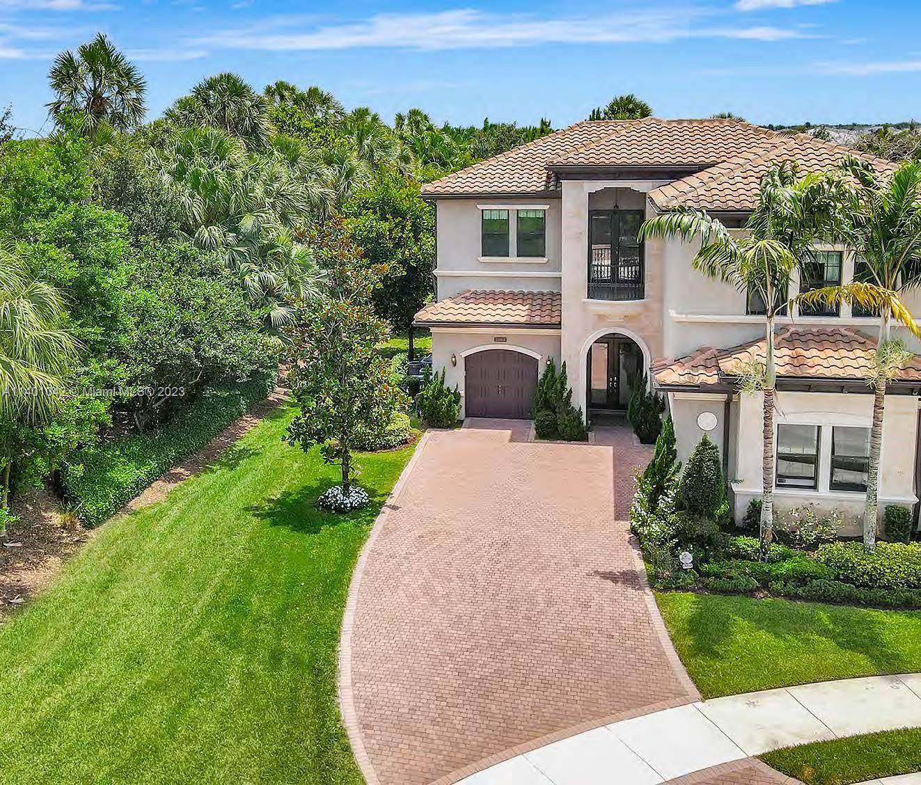 Welcome home ! This Amazing Contemporary 5 Bedroom 5 1 2 Bath property is located on a cul de sac with impressive lush green landscaping and privacy which is one ...