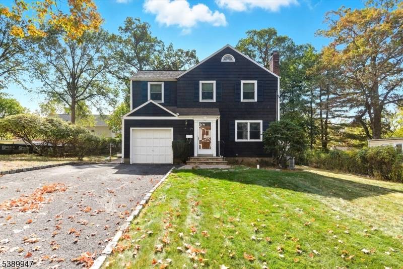 Welcome To This Inviting Colonial Nestled In One Of Livingston's Premier Million to Two Million Dollar Neighborhoods.