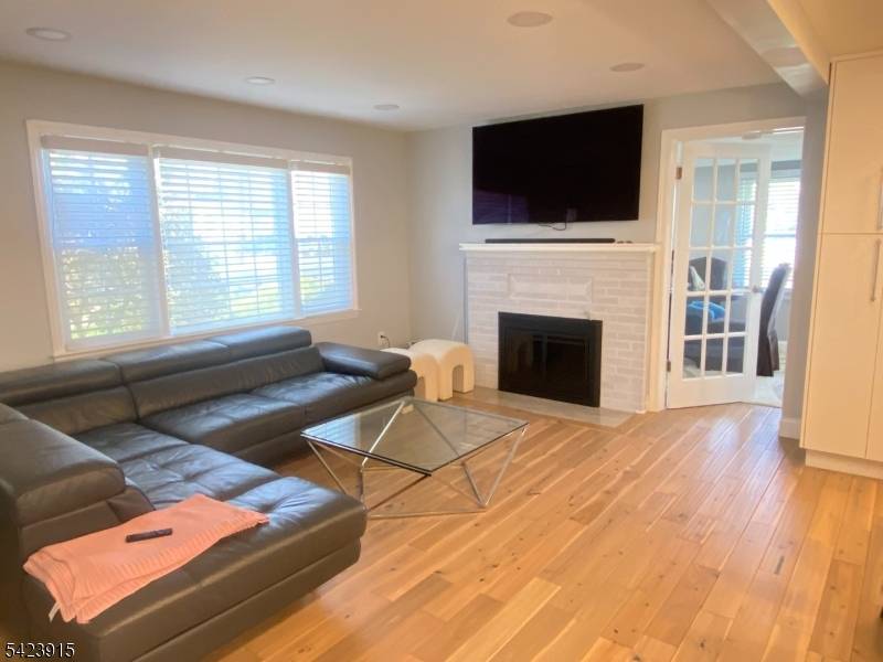 Updated 3 bedroom, 2 bath Colonial featuring a Gourmet Eat in Kitchen with Quartz Countertop, Stainless Steel Appliances including a gourmet 6 burner stove, Center Island with Quartz Waterfall Countertop, ...