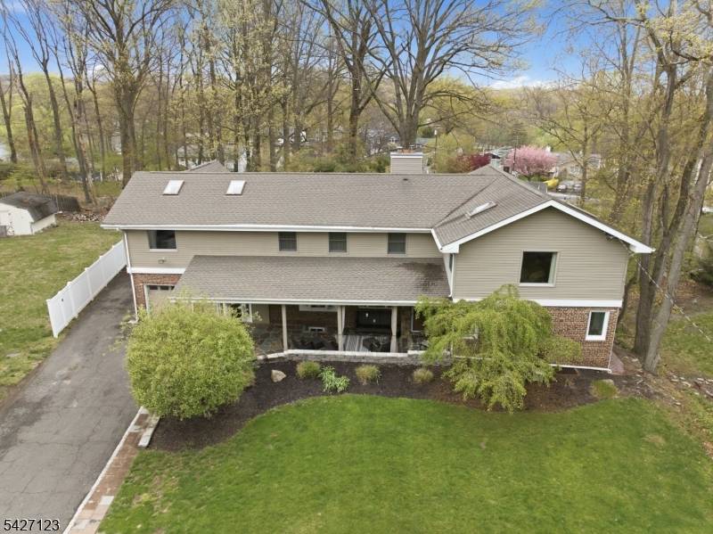 Experience this MASSIVE Colonial Expanded Ranch residence situated in highly sought after White Meadow Lake community within walking distance to your very own private Beach and just 1 hour to ...