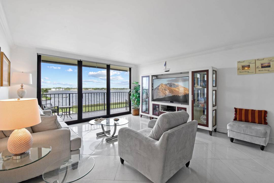 Experience the best of Coastal living from this magnificent corner condo with wrap around balcony that captures panoramic Intracoastal waterway views as well as side Ocean views.
