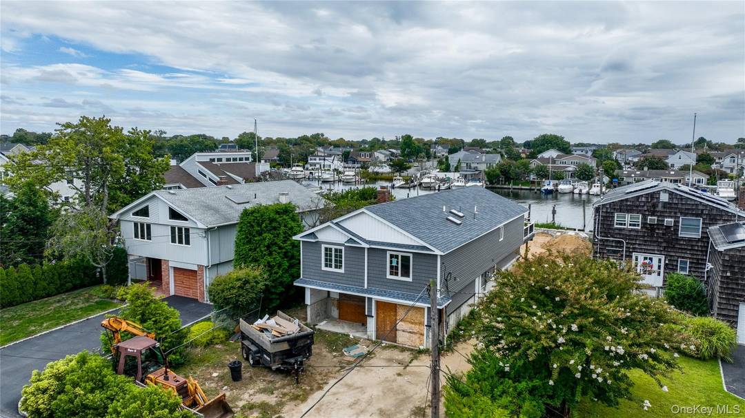OPPORTUNITY TO CREATE YOUR DREAM WATERFRONT HOME IN THE VILLAGE OF LINDENHURST.