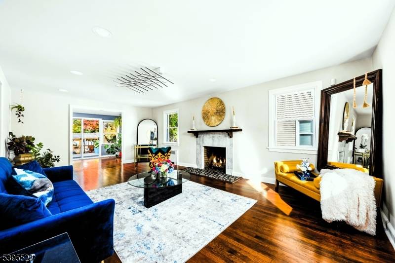 Step inside this beautifully renovated three bedroom, two and a half bath Colonial in the heart of Maplewood, New Jersey.