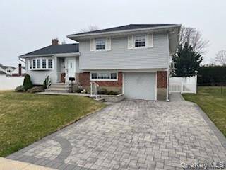 3 Bedroom, 2 Bath Split Level Home in the Heart of Plainview.