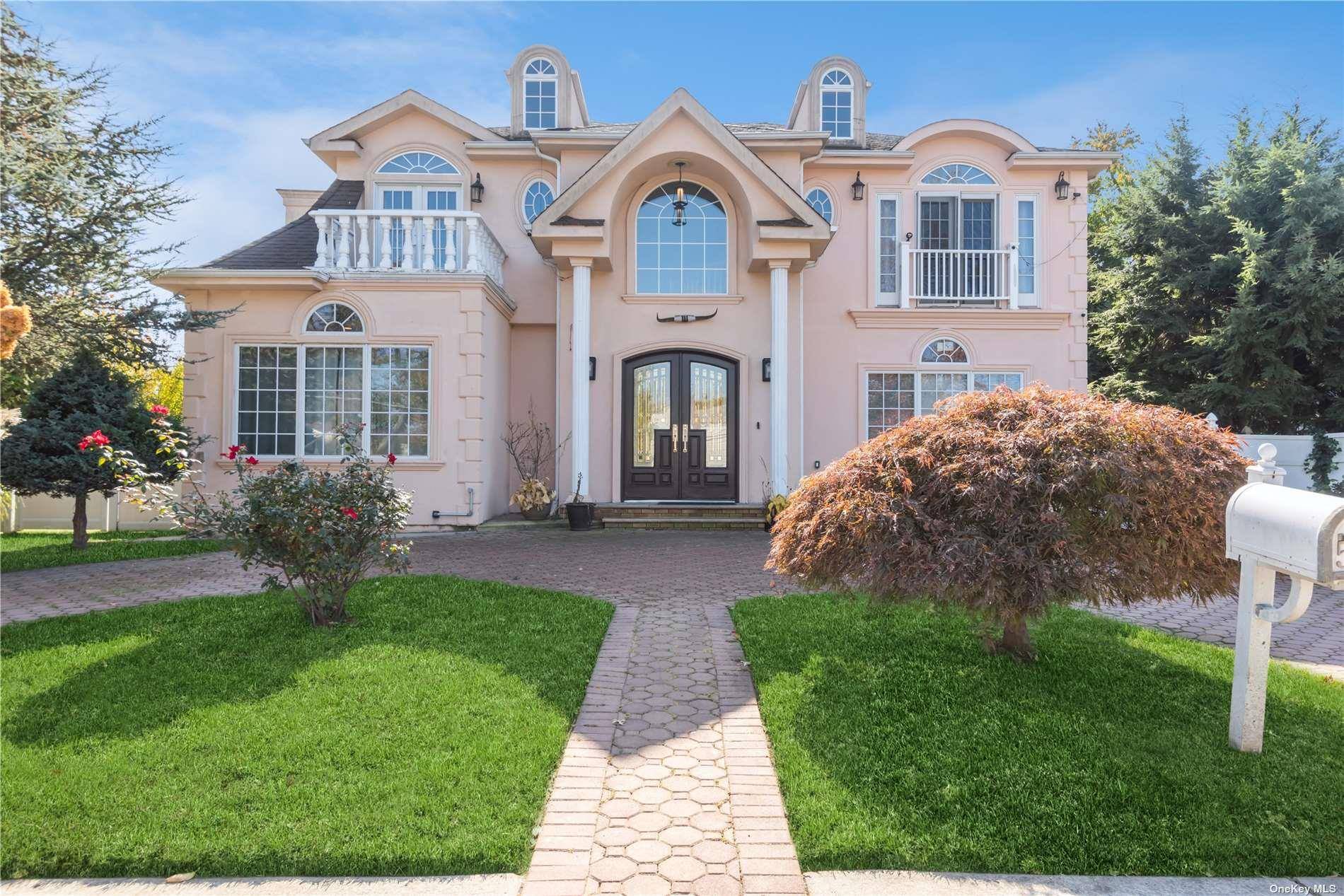 This stunning 6 bedroom, 5.