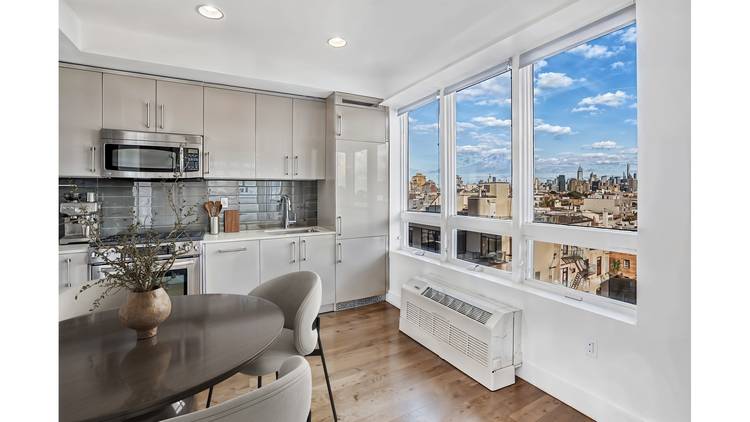 Sun drenched and beautifully appointed, Residence 6D at 139 Skillman Avenue is a rare corner alcove studio offering a private balcony, private storage, and sweeping open views across both Manhattan ...
