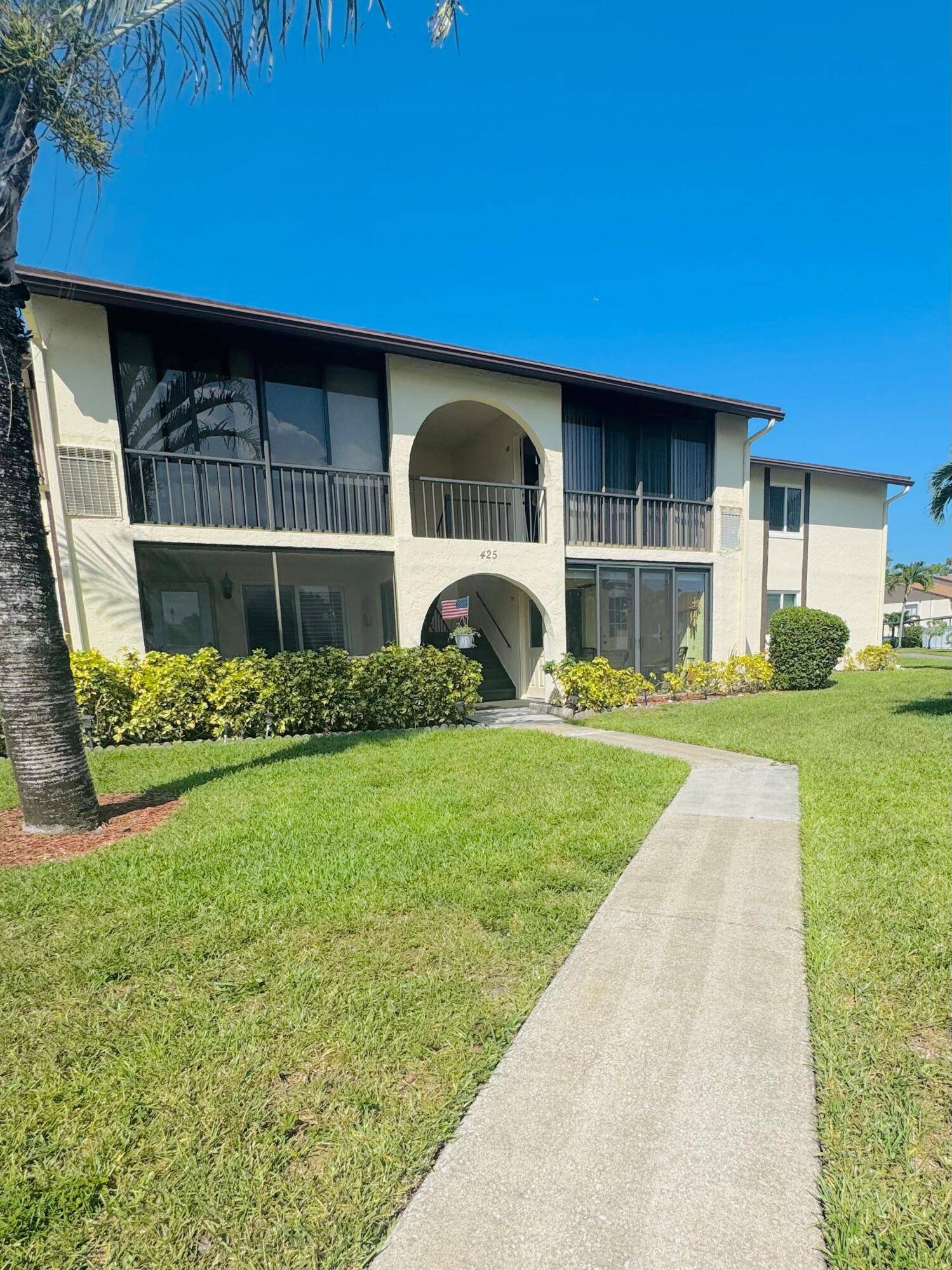 Enjoy serene lake and pool views from this beautiful 55 community apartment.