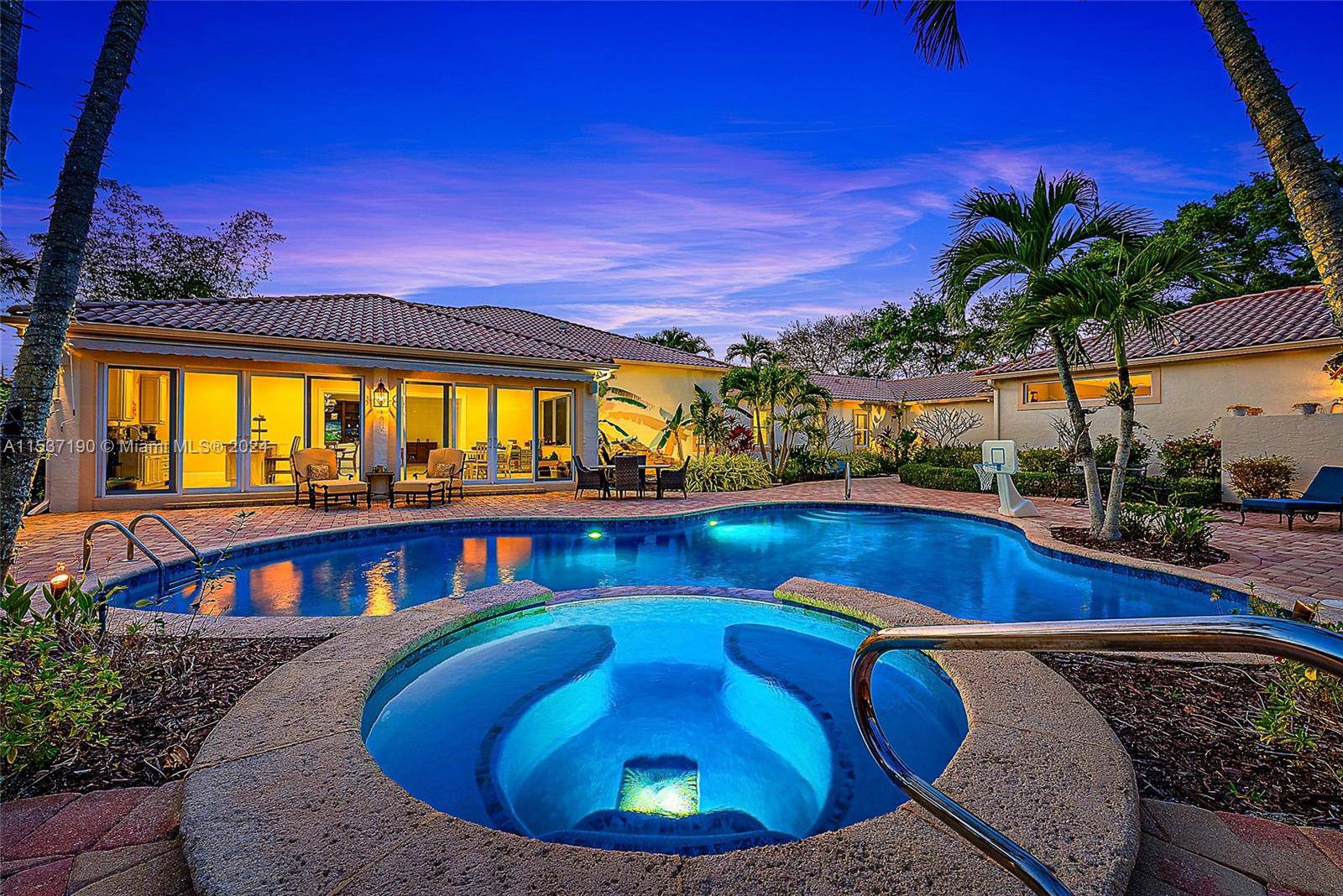 DOUBLE LOT Situated in the prestigious Admirals Cove, this property stands as a rare gem, encompassing one of the few double lots available.
