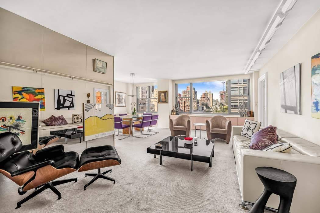 Perfectly positioned within a premier full service cooperative on York Avenue in the East 80s, this sun splashed three bedroom, two bath residence offers remarkable light, scale, and potential.