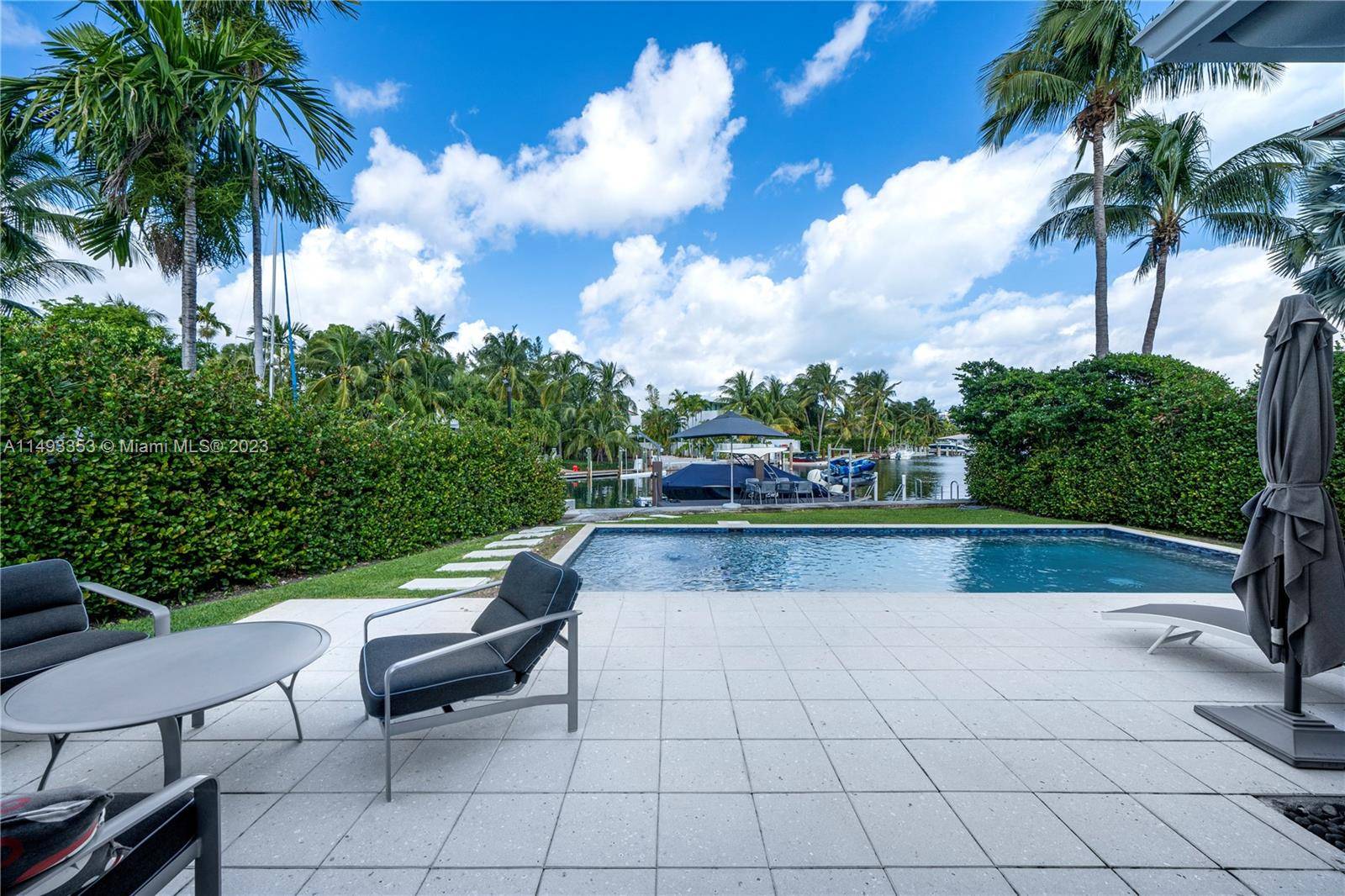 Fab 50's waterfront home on secluded Biscaya Island with no bridges to the bay.