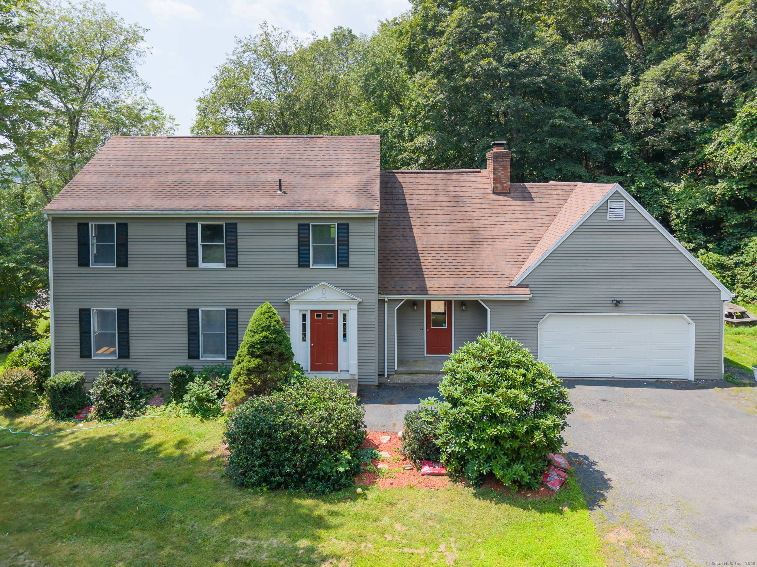 Welcome to 67 Cedar Ridge Drive, sitting peacefully at the end of a quiet cul de sac in Watertown.