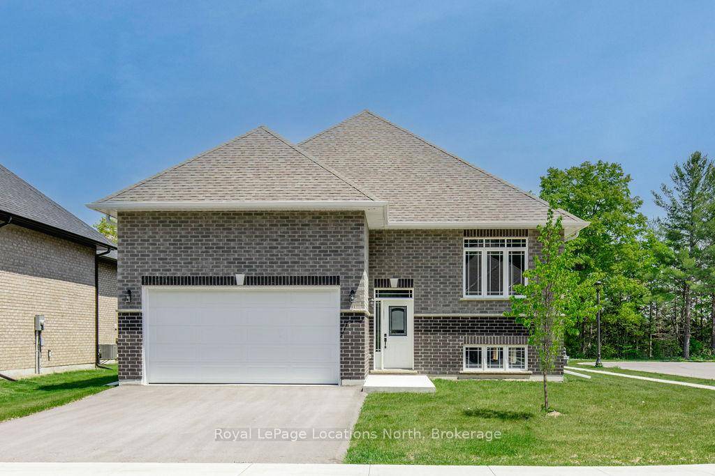 Introducing a stunning new all brick raised bungalow on a premium corner lot, measuring 61.