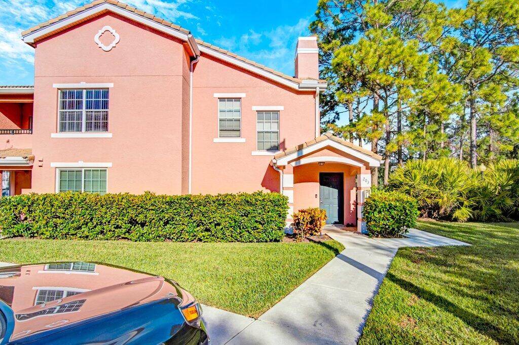 Discover this charming 2 bedroom, 2 bathroom end unit in the gated community of The Belmont, nestled in desirable St.