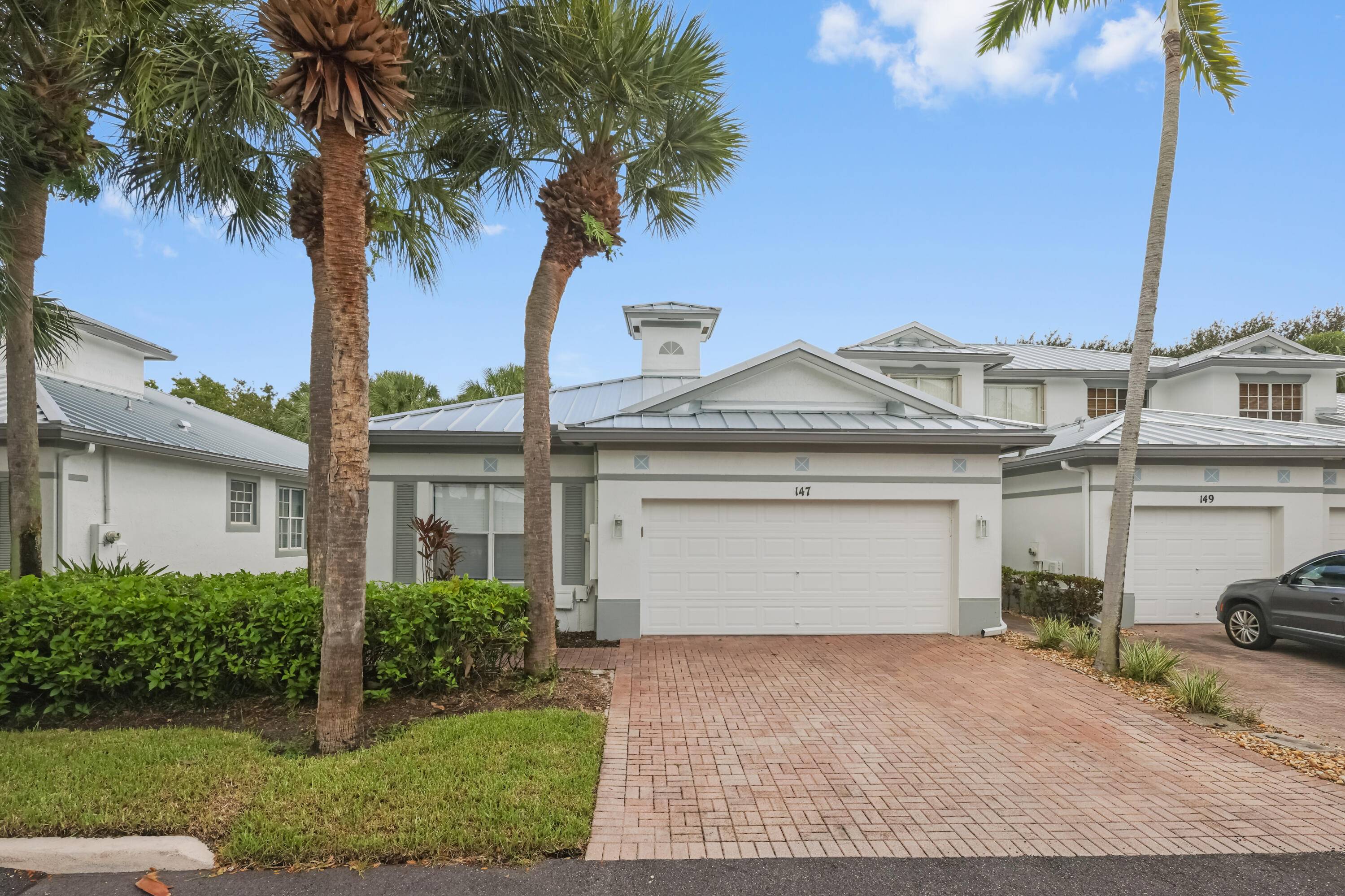 A MUST SEE ! ! This Charming 3 bedroom Villa in a delightful gated Community, conveniently located off Atlantic Ave.