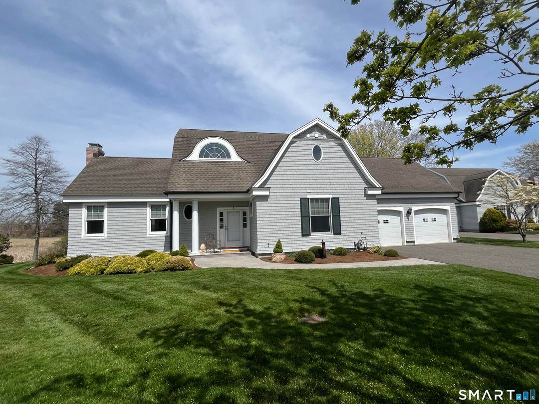 Nestled along the serene shores of North Cove, this exceptional 2, 300 square foot detached shingle style condo perfectly blends coastal elegance with unmatched privacy.