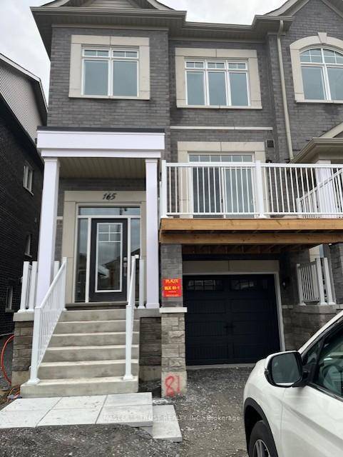 Brand New Never Lived In Freehold End Unit Townhome with backyard backing onto King St.