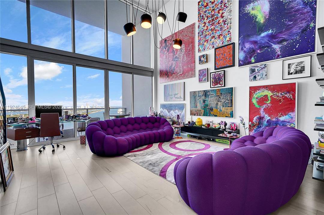A two story loft where a 20 foot ceiling transforms 1, 794 SQ FT into a dramatic, light filled stage for the Miami skyline.