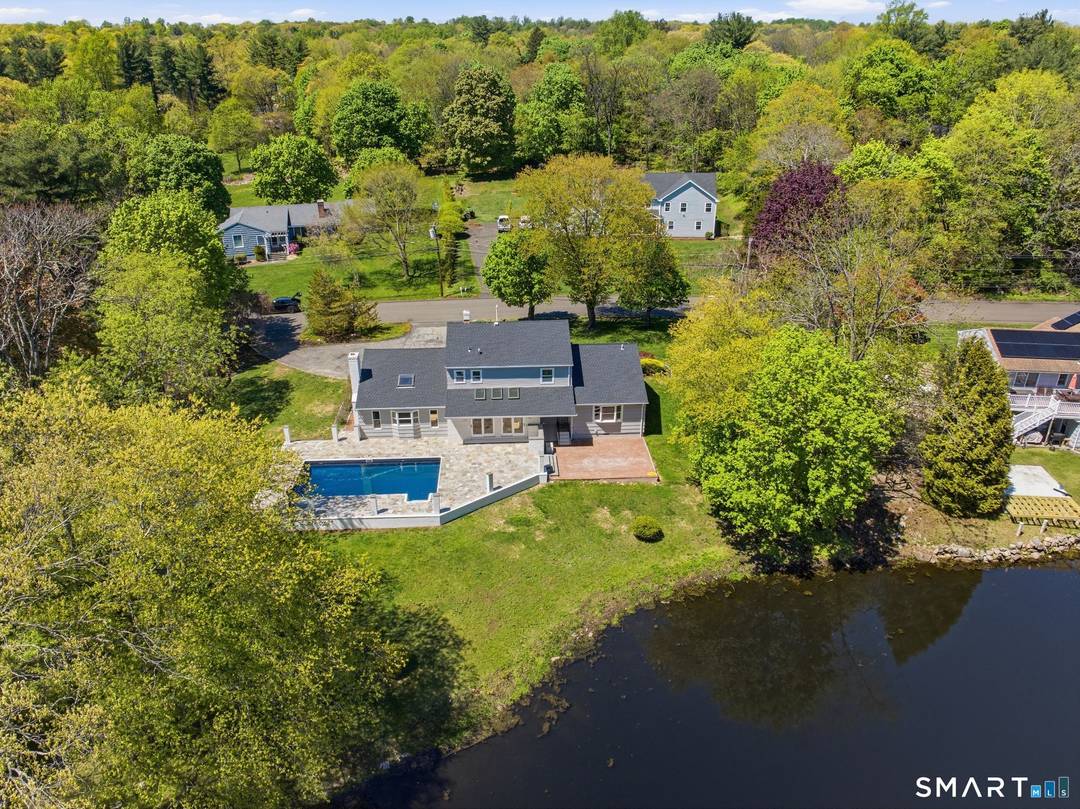 Rare Pondside Retreat Life here changes beautifully with the seasons.