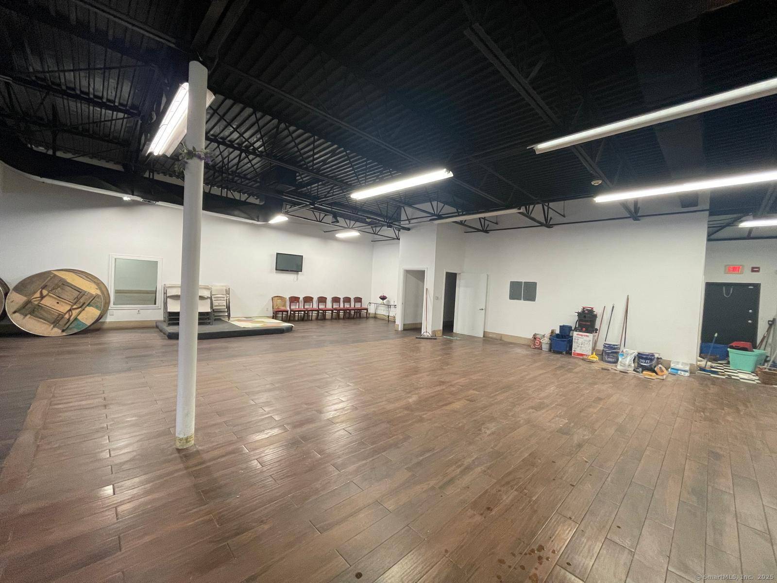 This spacious commercial property is located in a prime, high traffic area, offering excellent visibility and easy access for both customers and clients.