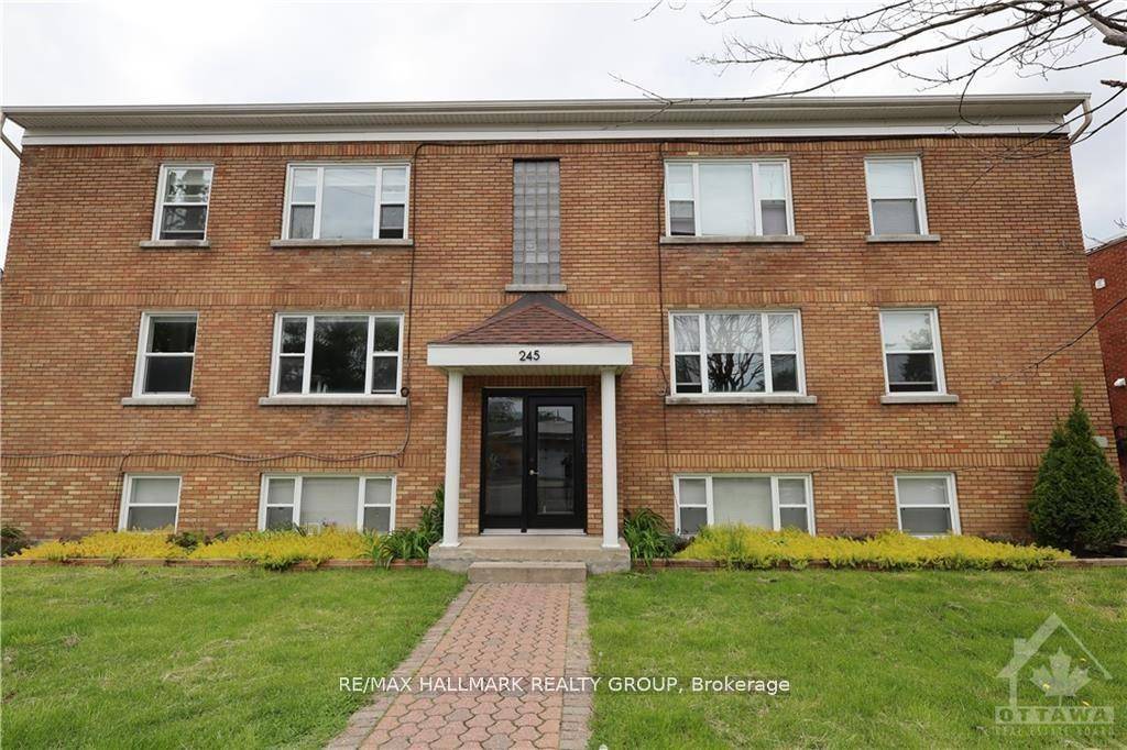 Step into this beautiful unit featuring a spacious living room with large windows that flood the space with natural light.