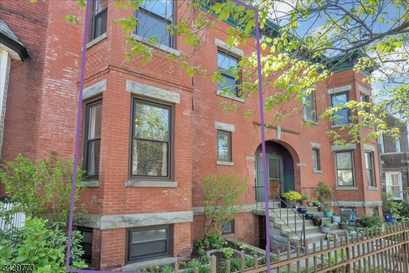 Charming Victorian row house offering 4 bedrooms and 1.