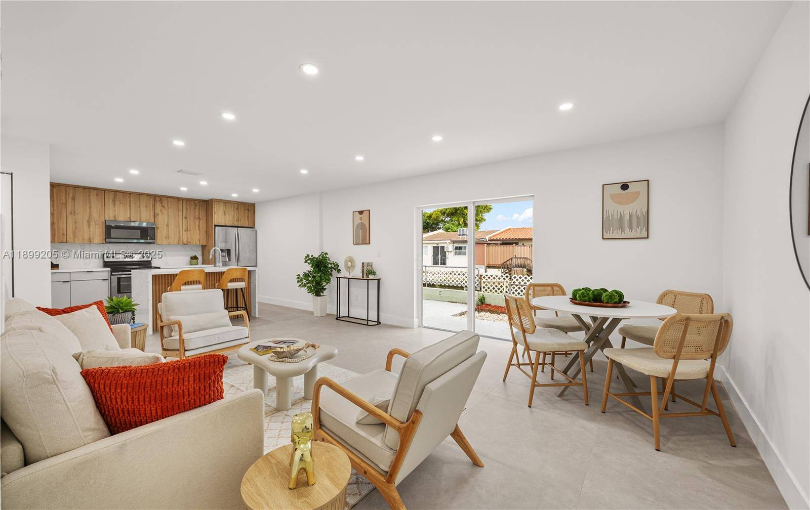 Beautiful, modern, and fully renovated townhome featuring impact doors and windows, along with a contemporary kitchen and bathrooms.