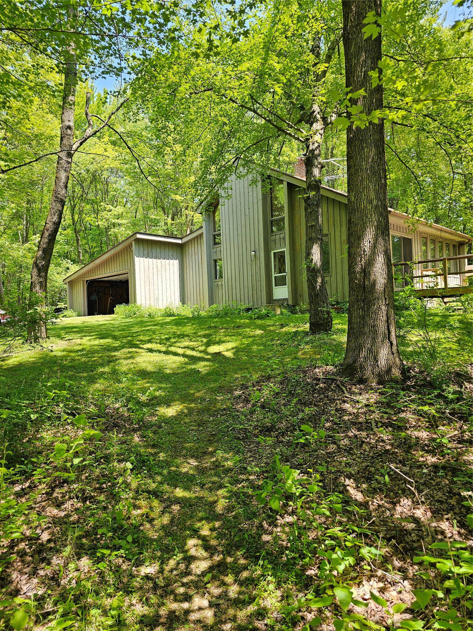 Welcome to your private retreat, complete with 5 acres of nature.