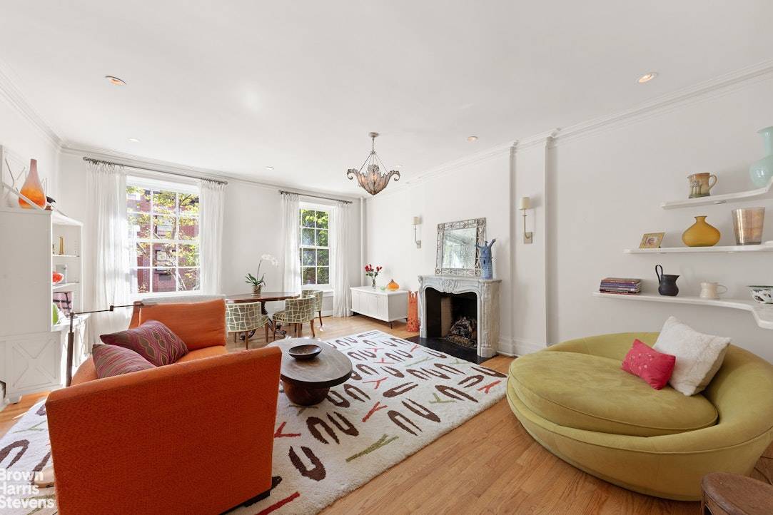 Located on one of the most desirable streets in Greenwich Village is this historic extra wide townhouse 27' with an enchanting terrace.