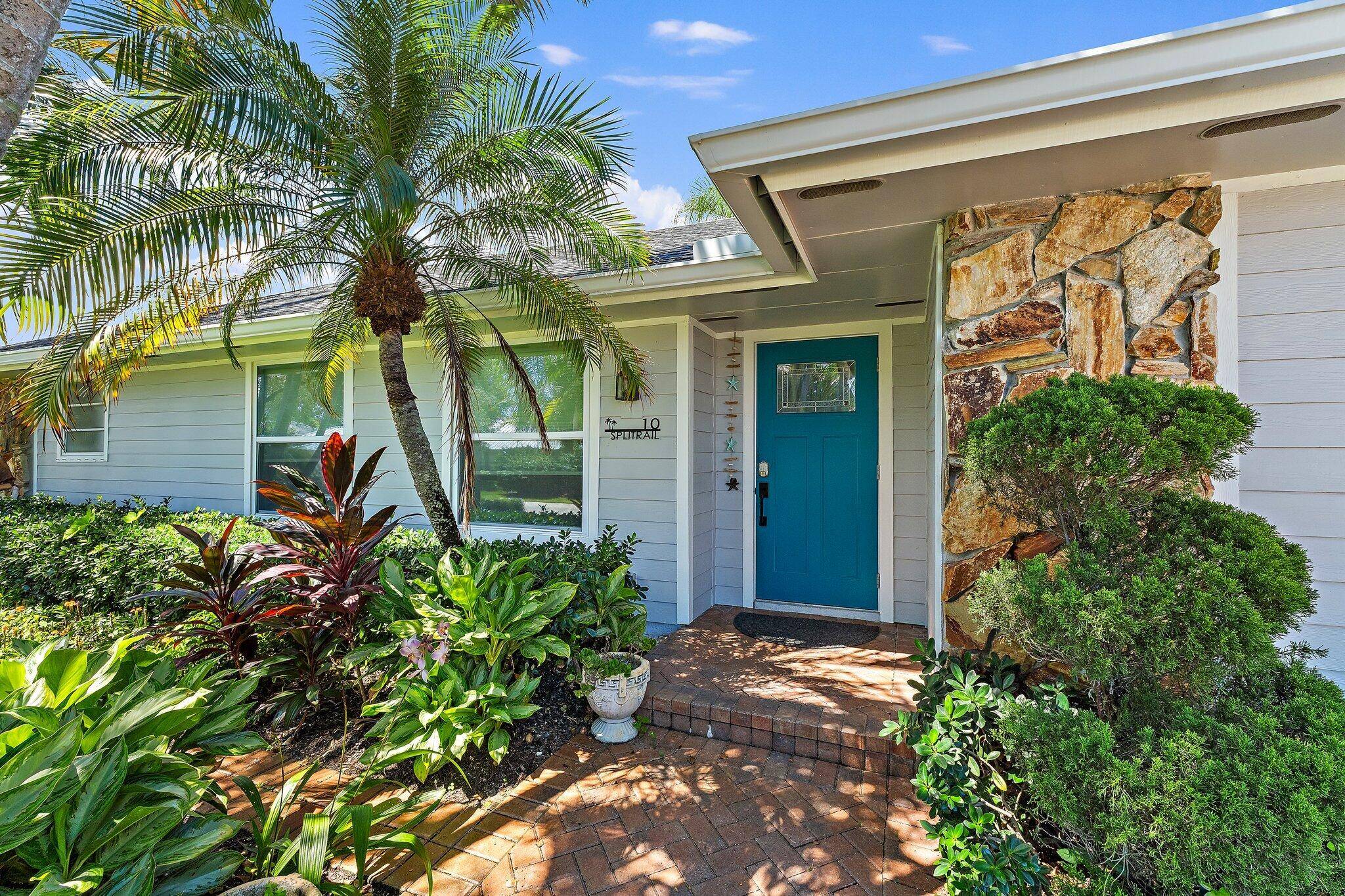 Located in the gated and prestigious Turtle Creek Club community of Tequesta, this updated 3BR 2BA Key West style home offers vaulted ceilings, split floor plan, and multiple living spaces.