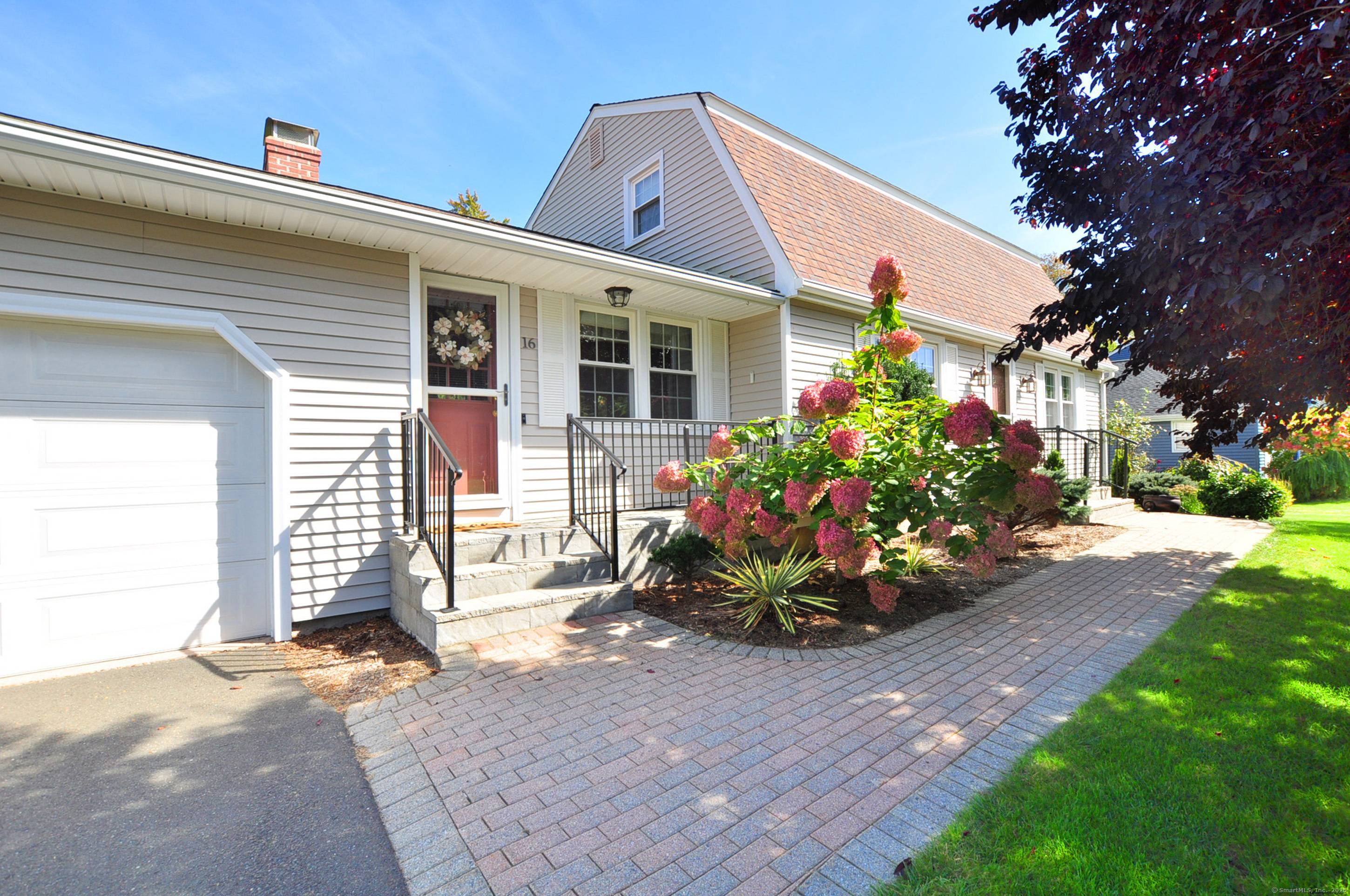 Discover exceptional living in this pristine and stunning four bedroom New England Colonial home, nestled on a gorgeous.