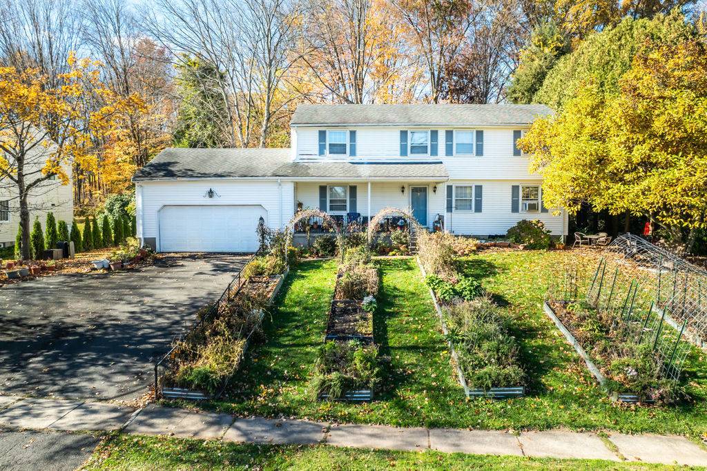 Spacious 5 bedroom Colonial offering tremendous potential !