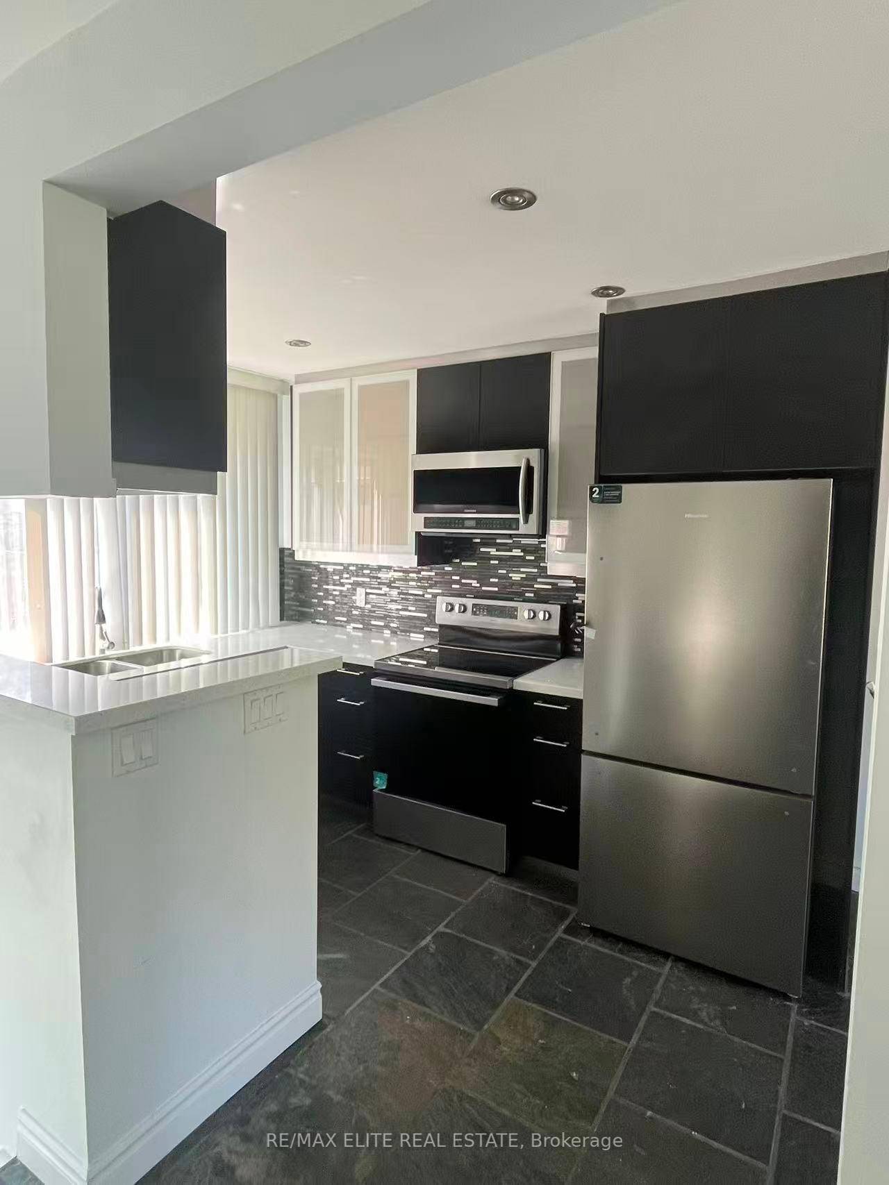 L Shape property. Main Unit including the upper floor and basement.