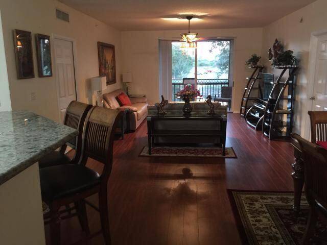 LUXURIOUS 2 BED, 2 BATH CONDO WITH 1 CAR GARAGE, JUST MINUTES FROM EQUESTRIAN VENUES AND THE NPC !