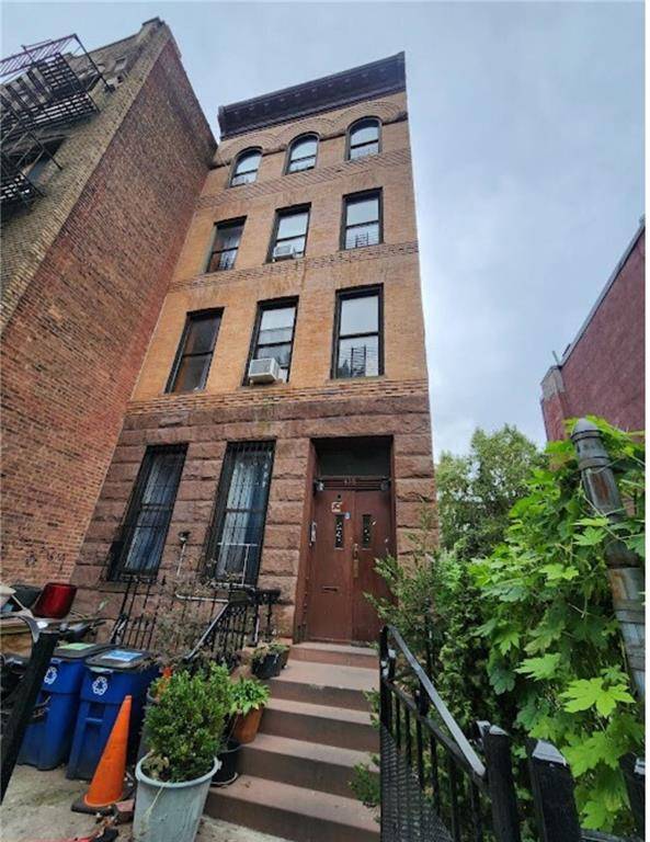 Welcome to 458 Halsey Street, A beautiful well maintained Semi Attached 4 family brownstone fa ade SOLID BRICK House is located in Bedford Stuyvesant Heights !