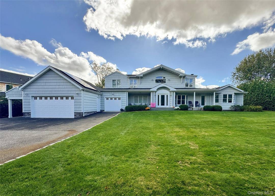 This warm and welcoming home offers a spacious layout with multiple living areas and an abundance of natural light throughout.