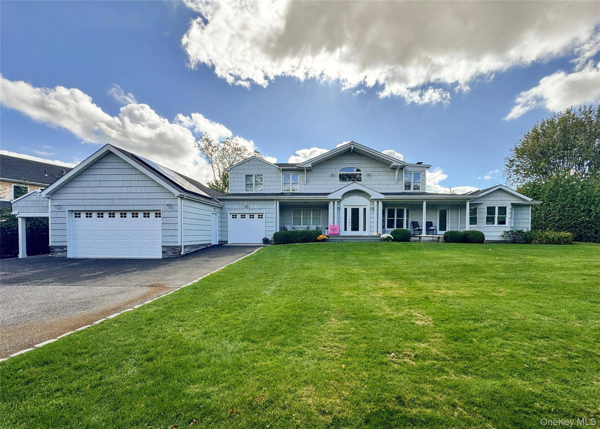 This warm and welcoming home offers a spacious layout with multiple living areas and an abundance of natural light throughout.