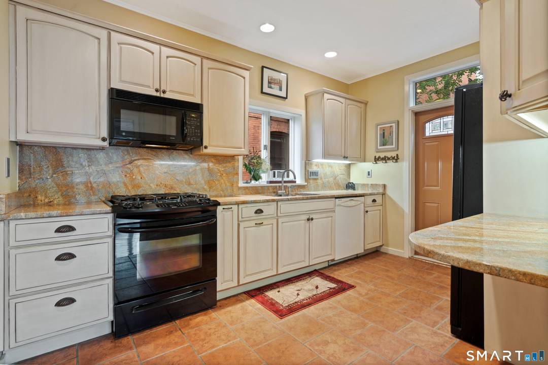 Set in the historic Russell Hotchkiss House, this wonderfully unique twobedroom, oneandahalfbath condo occupies half of a converted carriage house with view of the beautiful, cherryblossomlined Wooster Square Park.